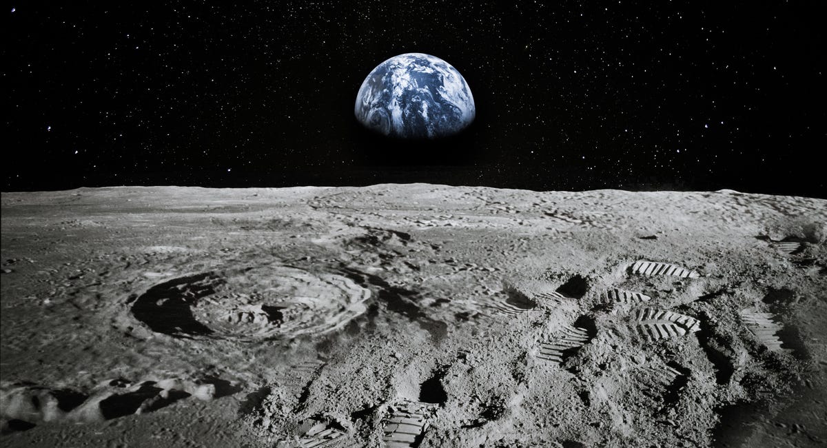 View of Moon with Earth rising on the horizon