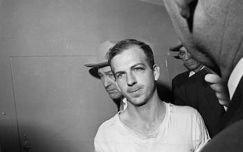 Not the guy: Lee Harvey Oswald after his arrest, 1963 Credit: AP
