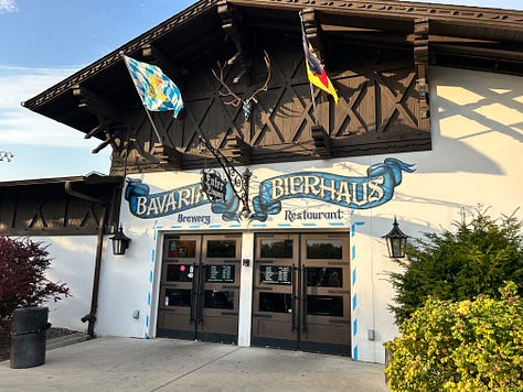 food, beer, stein, hall, tables, chairs, sign