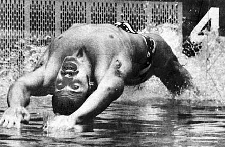 A person diving into water
Description automatically generated A person diving into water
Description automatically generated