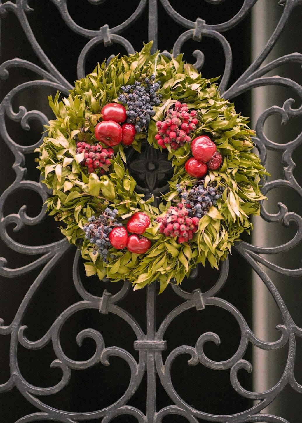 a Christmas Wreath on an Iron Gate