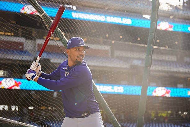 Mookie Betts of the Los Angeles Dodgers takes batting practice prior to the game between the Los Angeles Dodgers and the Philadelphia Phillies at... Mookie Betts of the Los Angeles Dodgers takes batting practice prior to the game between the Los Angeles Dodgers and the Philadelphia Phillies at...