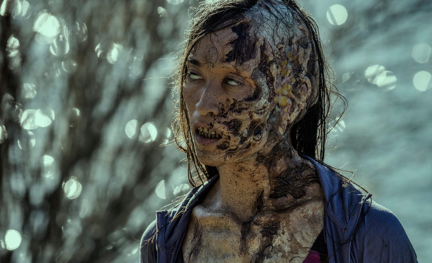 A movie still of a female zombie A movie still of a female zombie
