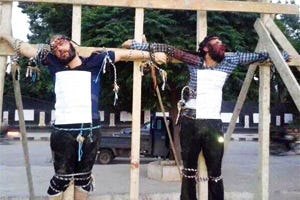 ISIS crucified two Syrian citizens accused of having spoken against ISIS. ISIS crucified two Syrian citizens accused of having spoken against ISIS.