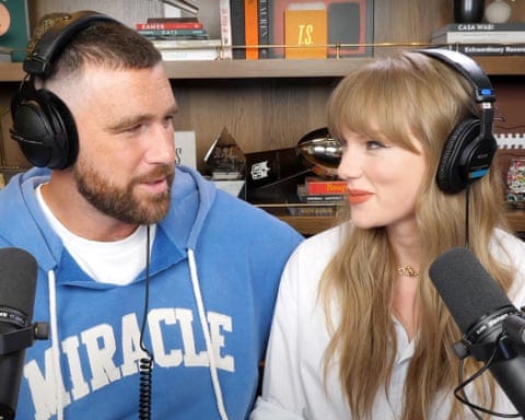 Taylor Swift and Travis Kelce looking at one another Taylor Swift and Travis Kelce looking at one another