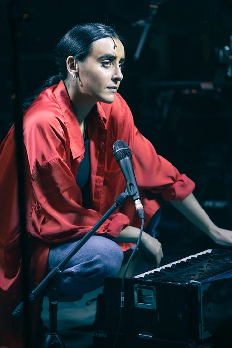 A series of images from Manic Street Creature, where Maimuna plays guitar on stage