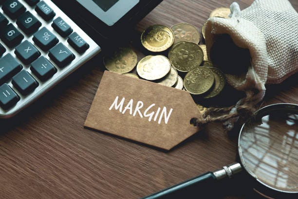 A calculator, magnifying glass, coins and tag written with Margin. Business and finance concept. A calculator, magnifying glass, coins and tag written with Margin. Business and finance concept. product margin stock pictures, royalty-free photos & images A calculator, magnifying glass, coins and tag written with Margin. Business and finance concept. A calculator, magnifying glass, coins and tag written with Margin. Business and finance concept. product margin stock pictures, royalty-free photos & images