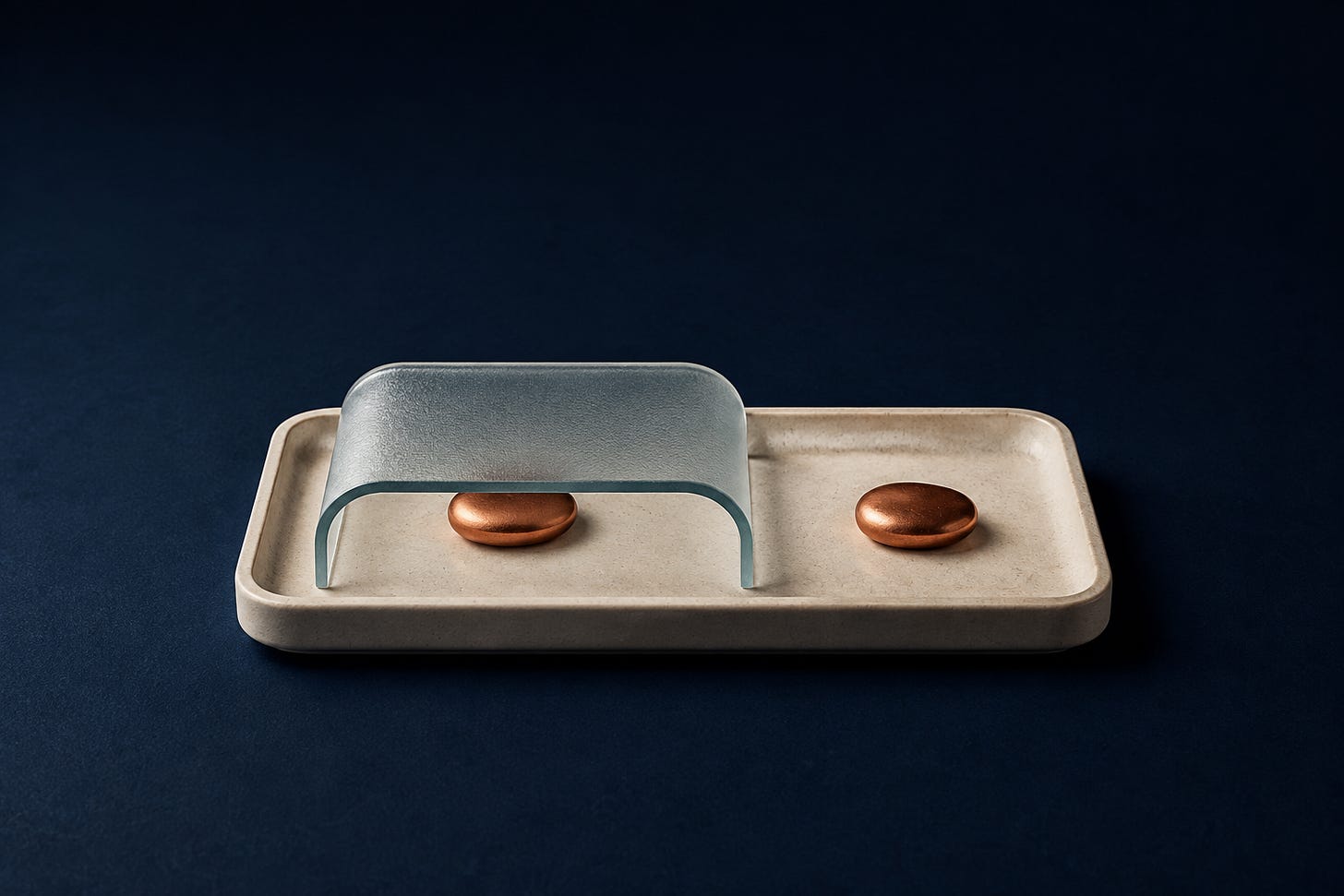 Editorial illustration of two copper pebbles on an ivory tray, one beneath a frosted glass canopy. Editorial illustration of two copper pebbles on an ivory tray, one beneath a frosted glass canopy.