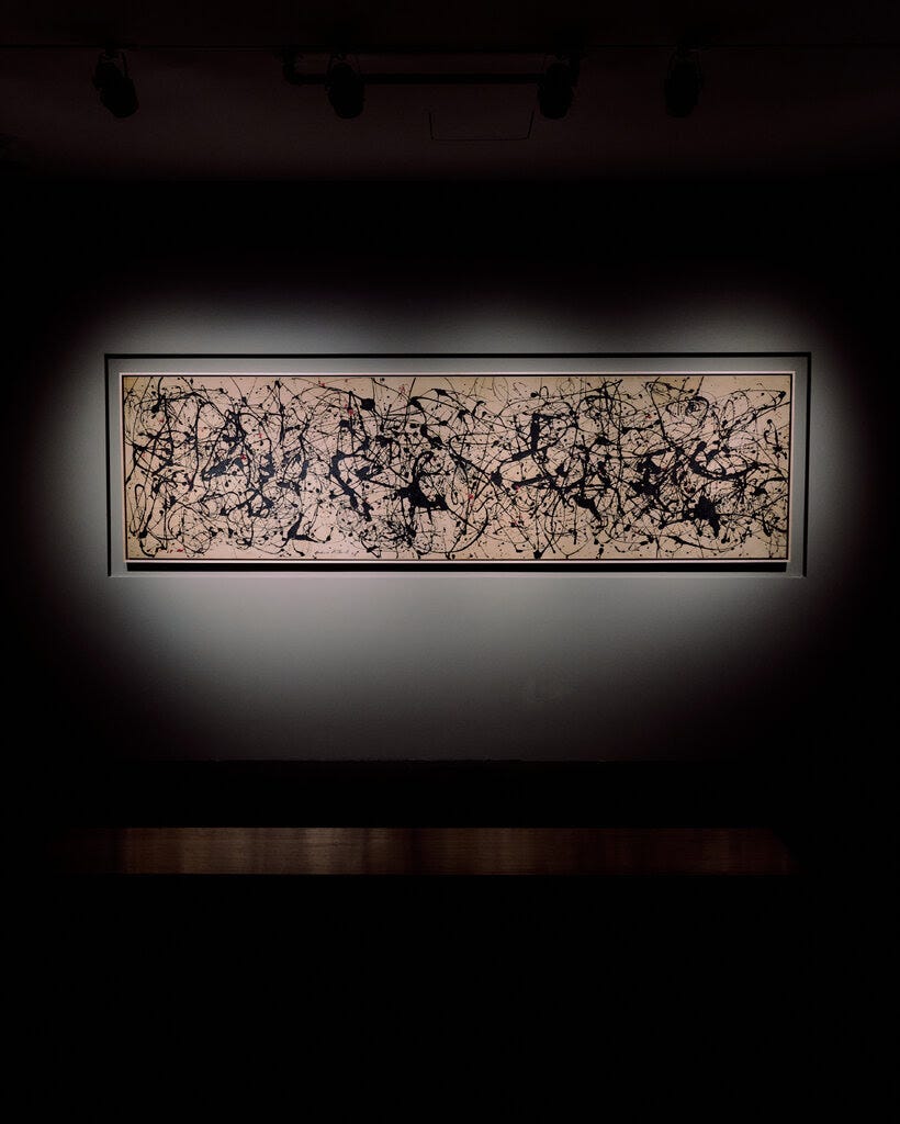 Abstract Expressionist drips on a very long canvas by Jackson Pollock. Abstract Expressionist drips on a very long canvas by Jackson Pollock.