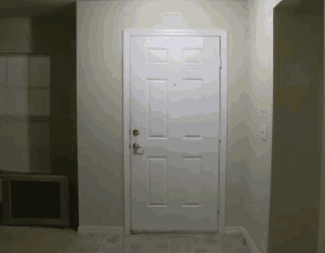 Big Bird kicks in a white door Big Bird kicks in a white door