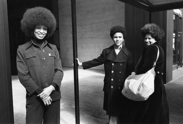 Angela Davis, left, with Ford and Toni Morrison outside the Random House offices on 50th Street. March 28, 1974. Angela Davis, left, with Ford and Toni Morrison outside the Random House offices on 50th Street. March 28, 1974.