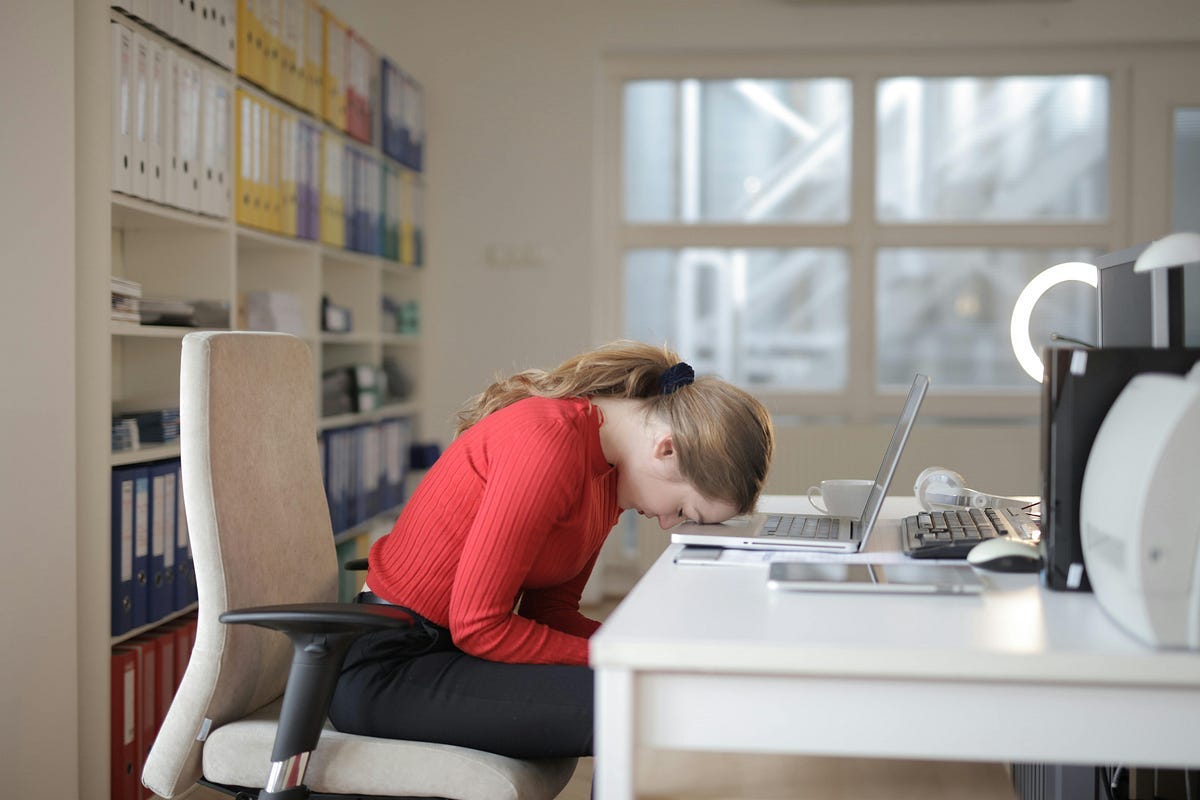 Woman leaning on laptop