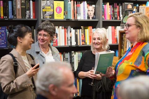 A grid of nine photographs of various groups of people at the book launch