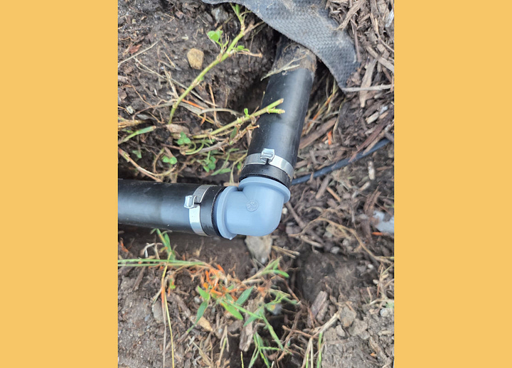 Close up images of PVC connections using pinch clamps