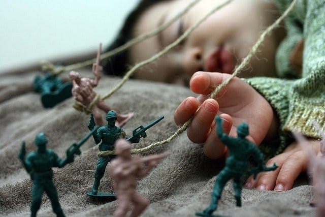 May be an image of child and toy May be an image of child and toy