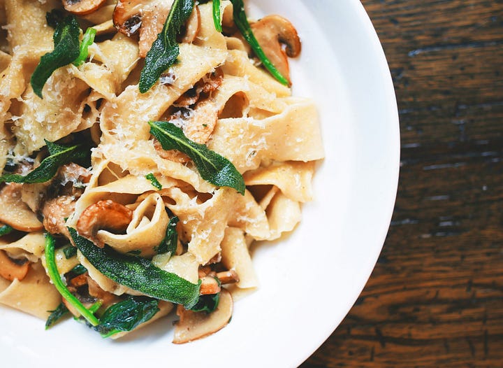 Fresh tomato slices and pasta. Photos by Okey Kat and Eaters Collective via Unsplash.