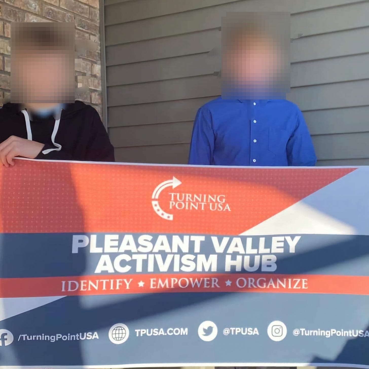 Alt Text: Photograph showing several minors, their faces intentionally blurred for privacy, holding a Turning Point USA (TPUSA) banner at what appears to be a TPUSA event or chapter meeting, illustrating the group's focus on youth activism and recruitment in schools. Alt Text: Photograph showing several minors, their faces intentionally blurred for privacy, holding a Turning Point USA (TPUSA) banner at what appears to be a TPUSA event or chapter meeting, illustrating the group's focus on youth activism and recruitment in schools.
