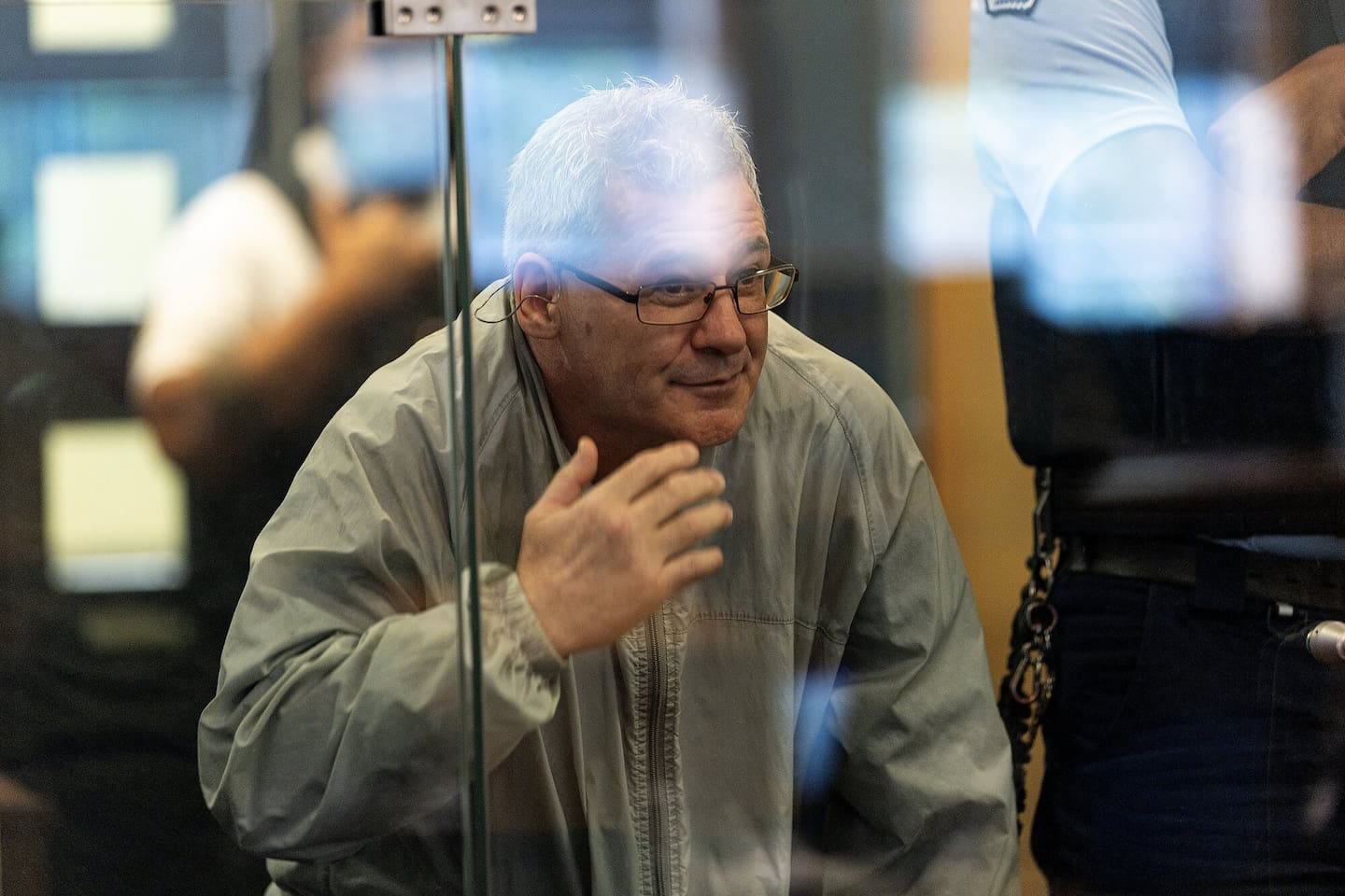Dean John Howard tried to hide his face as he was sentenced to preventive detention in the High Court at Auckland. Photo / Dean Purcell