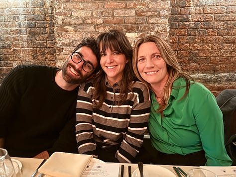 Photos of Meg, Stef, and Emily at a mountain lake. Photo of Emily in a jacket that says "angel of the get through." Photo of Meg flanked by Brandon and Stef sitting close beside each other.