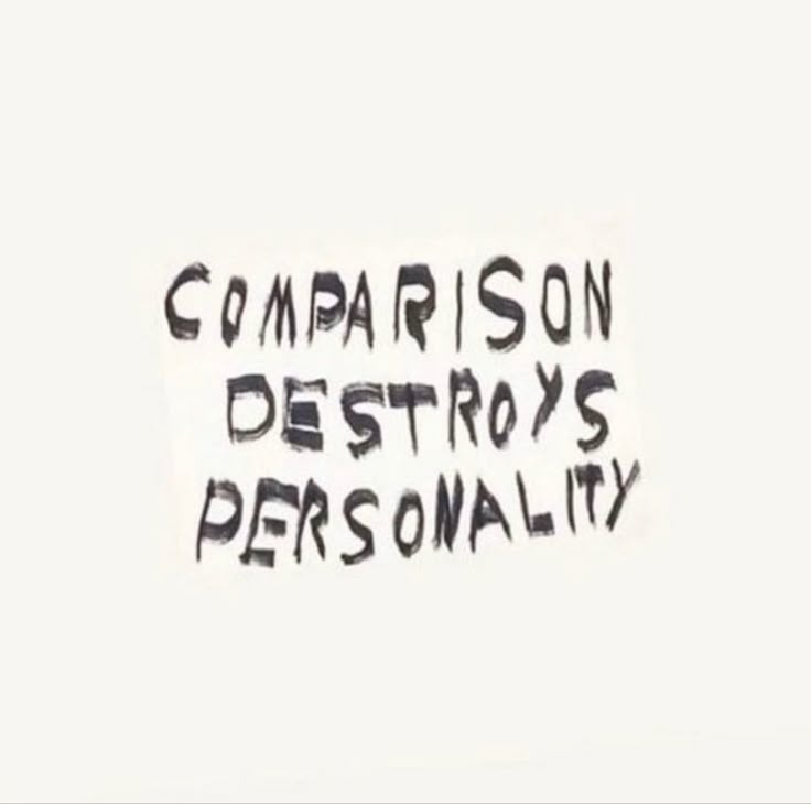 This may contain: a piece of paper with writing on it that says, comparison destroys personality