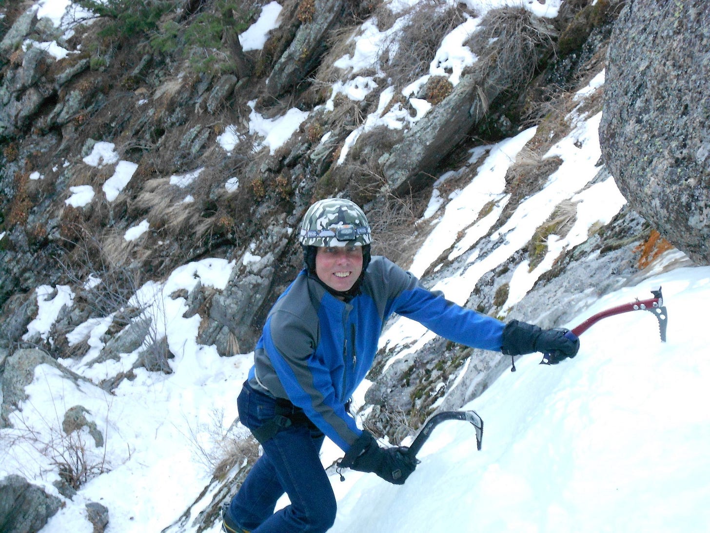 A person climbing a snowy mountain

AI-generated content may be incorrect.