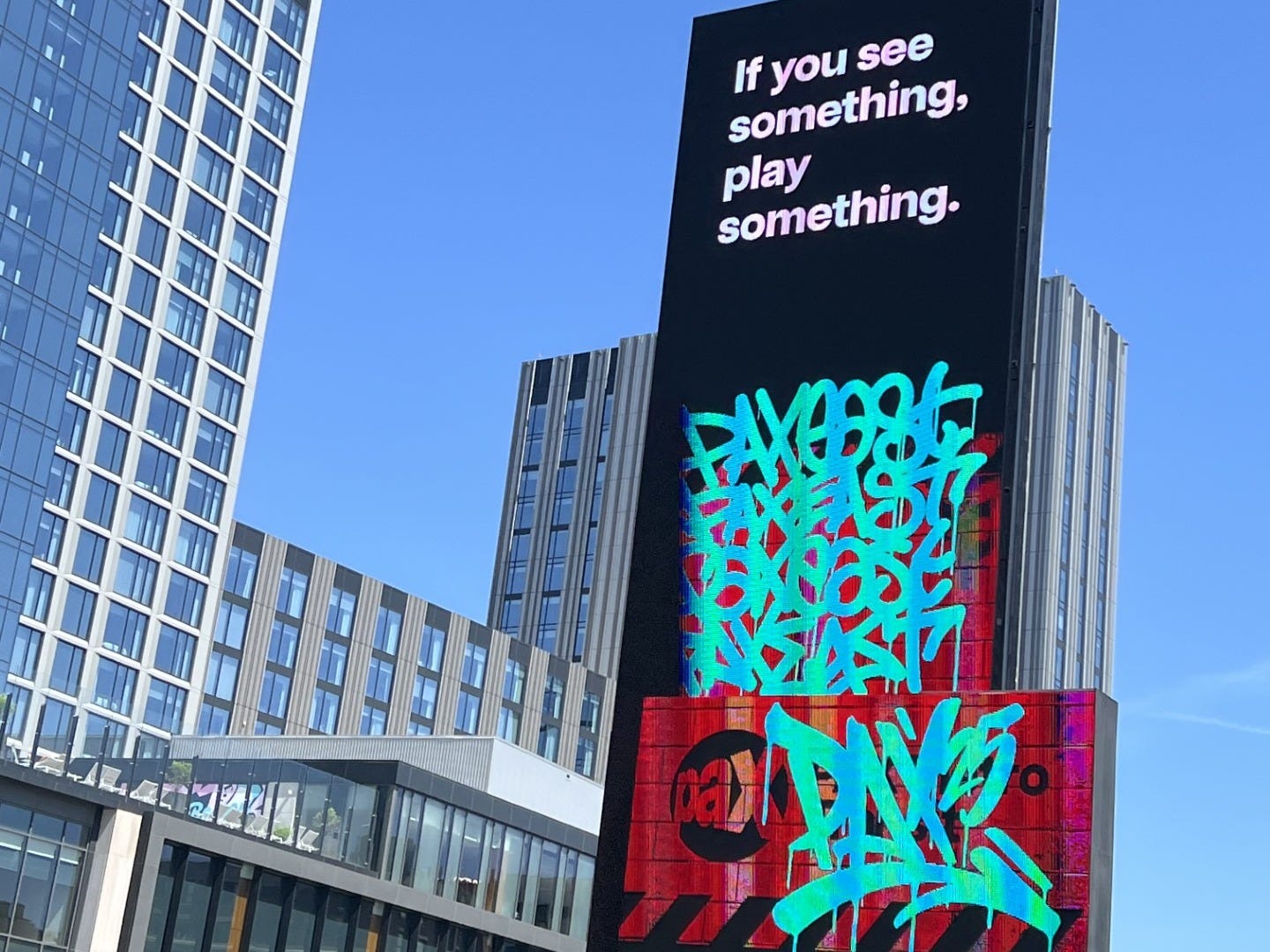 PAX display with the text "if you see something, play something."
