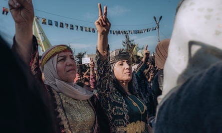 Demonstrators gather in one of Kobani’s main squares to mark the 10th anniversary of 26 January, 2015, the day Kurdish forces declared the city of Kobani liberated from IS.