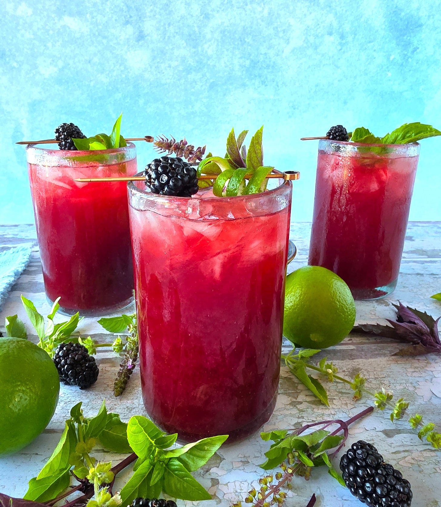 a side shot of 3 cocktails