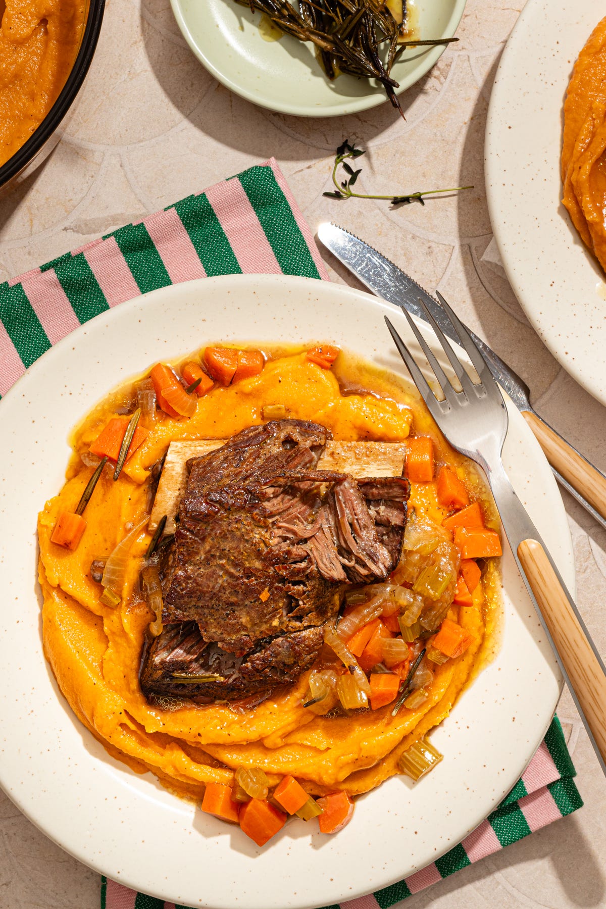 rosemary cider short ribs with maple sweet potato puree