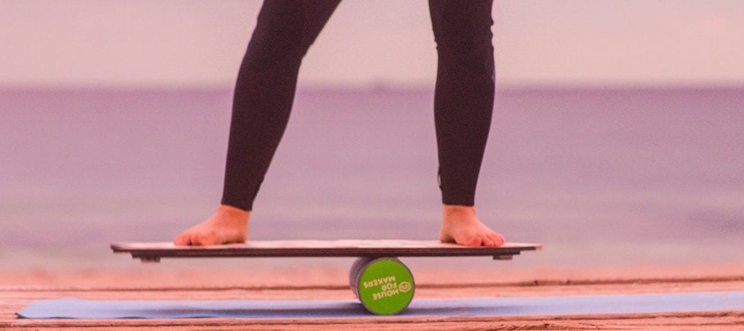 person on balance board