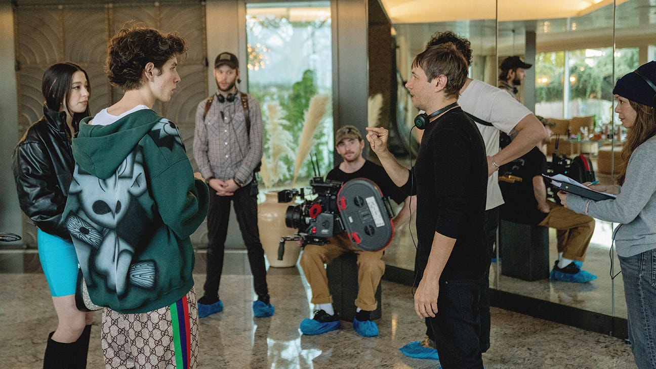 Cinematographer Drew Daniels (center) on the set of 'Anora' with Mikey Madison, Mark Eydelshteyn and Sean Baker.