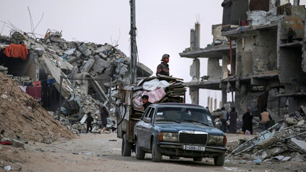 Palestinians who fled Rafah in the southern Gaza Strip arrive with their belongings to Khan Yunis on 15 May, 2024. Palestinians who fled Rafah in the southern Gaza Strip arrive with their belongings to Khan Yunis on 15 May, 2024.