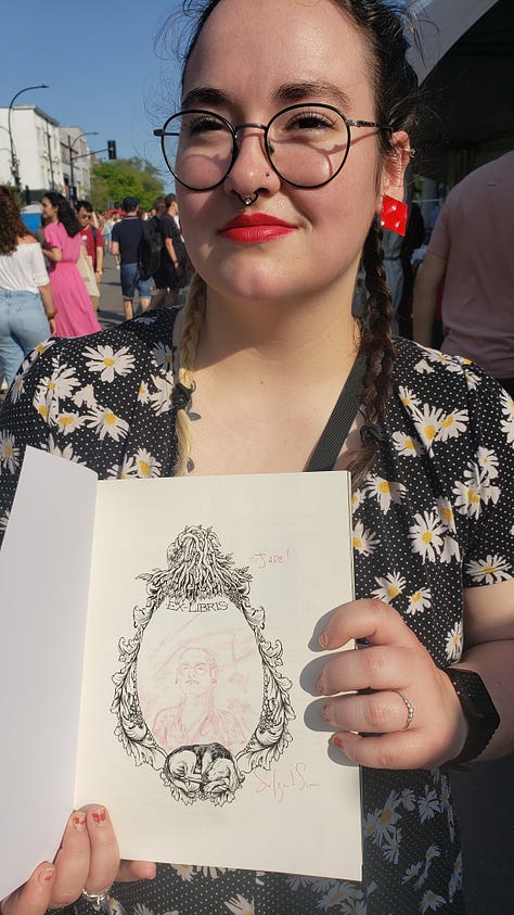 Shots of folks holding their copies of Dream Life, and the portraits I did of them in each