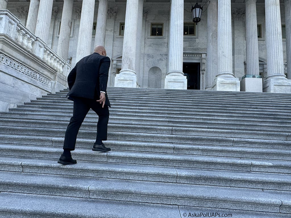 Rep. Andre Carson walks up the US Capitol steps and ornate antique columns. Photo: Matt Laslo @ Ask a Pol 