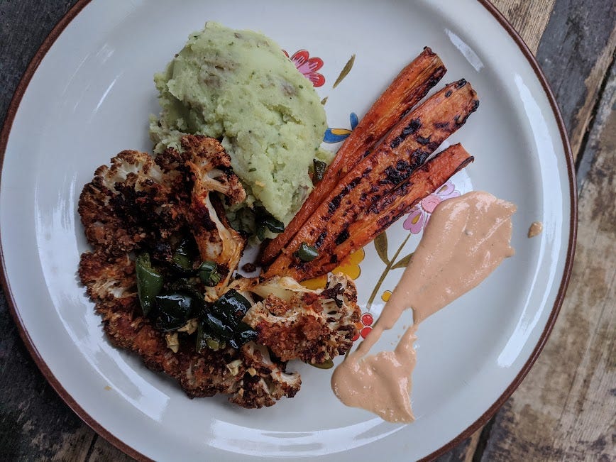 a dinner plate of cauliflower steak