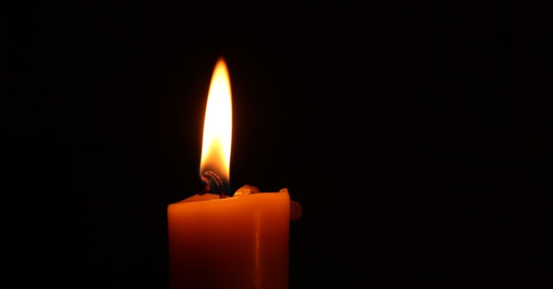 close-up of lighted candle close-up of lighted candle