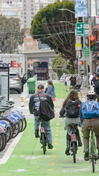 A group of people riding bicycles

AI-generated content may be incorrect.