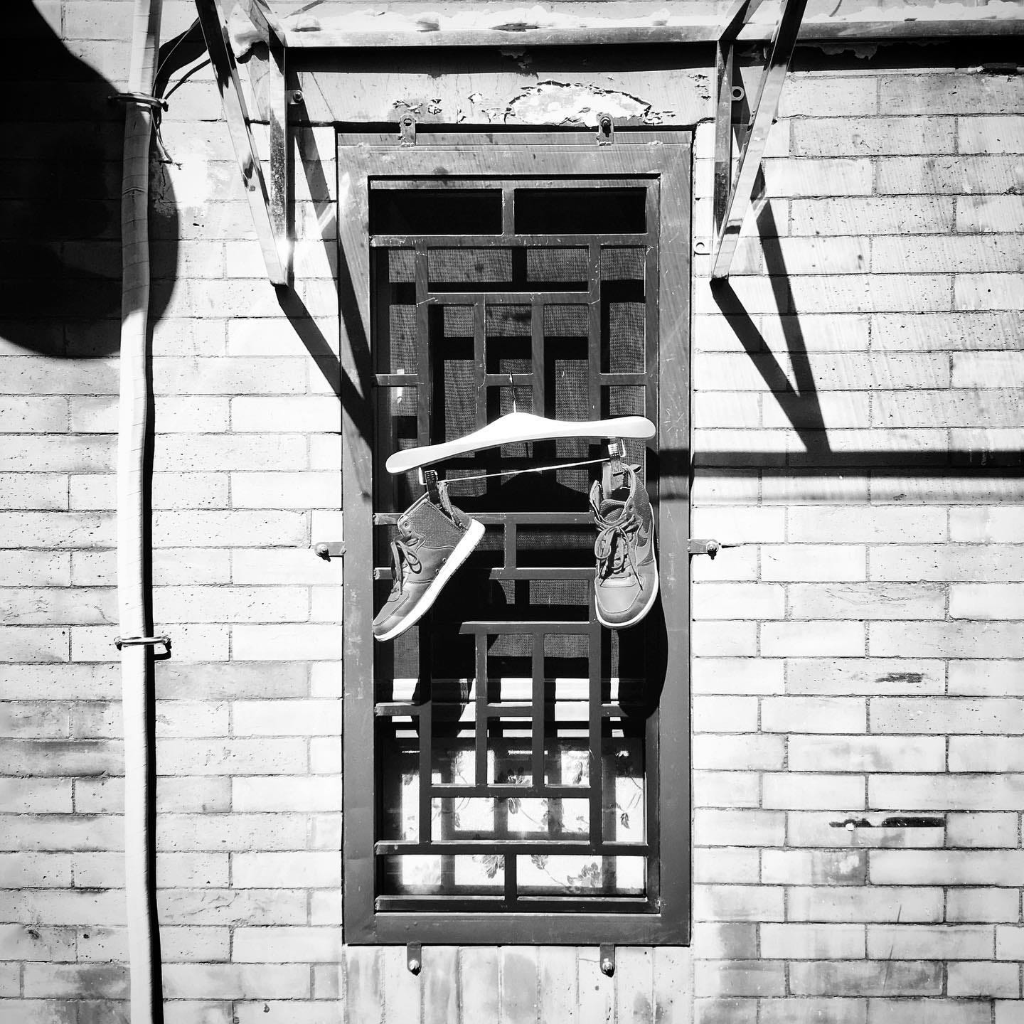 Window of a home in one of Beijing's historic hutongs.