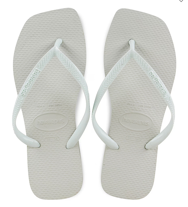 the viral thongs with the square toe from the australian brand havaianas in black and white perfect for summer and europe