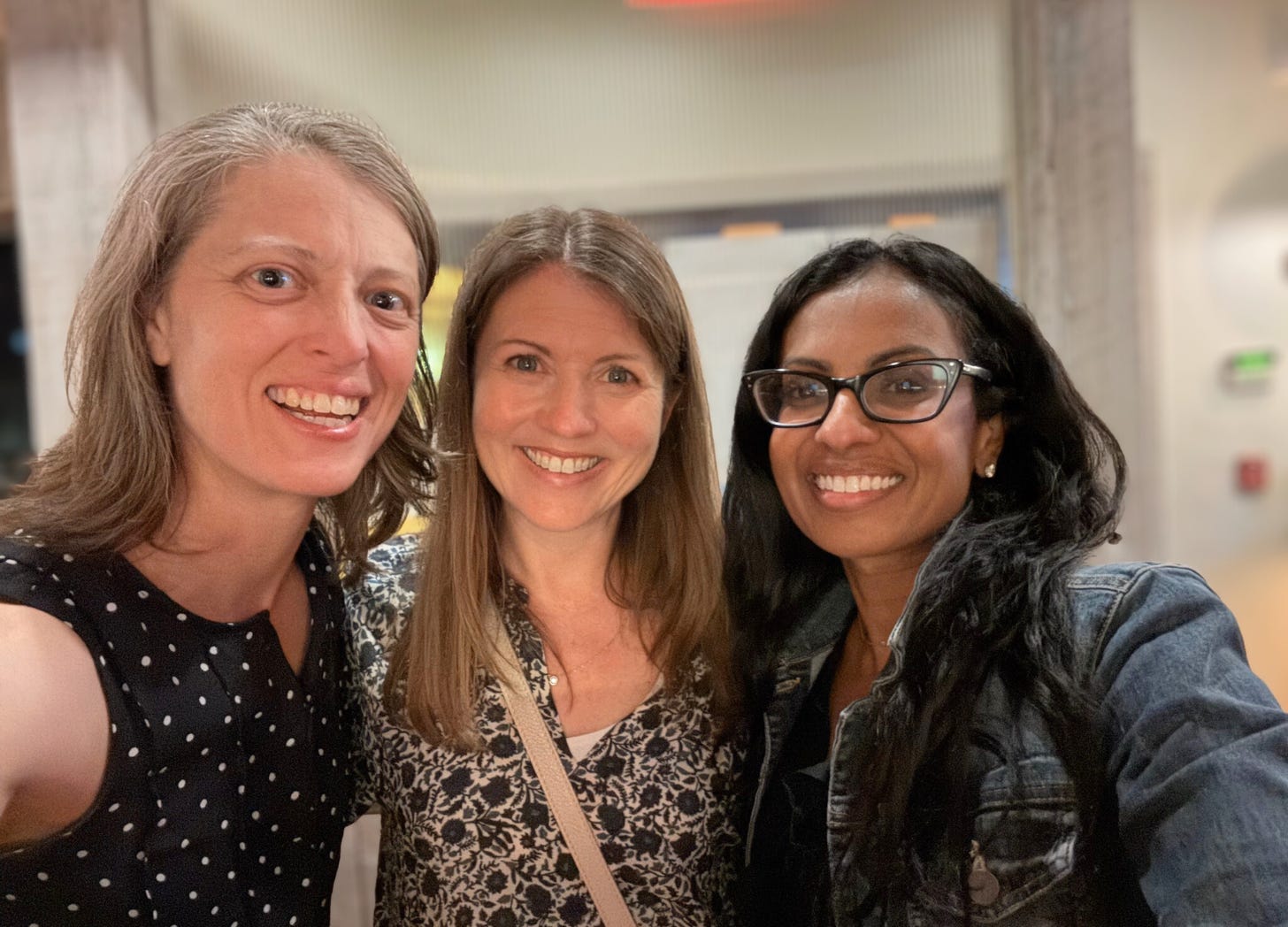 Amy Julia and her two friends smiling for a selfie