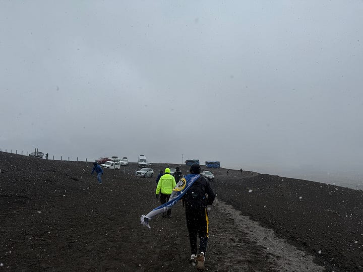 Hiking the Cotopaxi volcano in hail at over 15,000 ft altitude.
