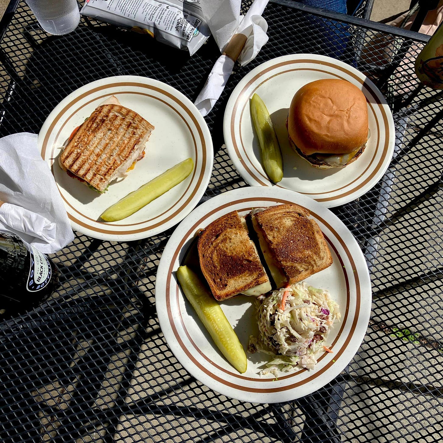 May be an image of chicken sandwich, club sandwich and rye bread