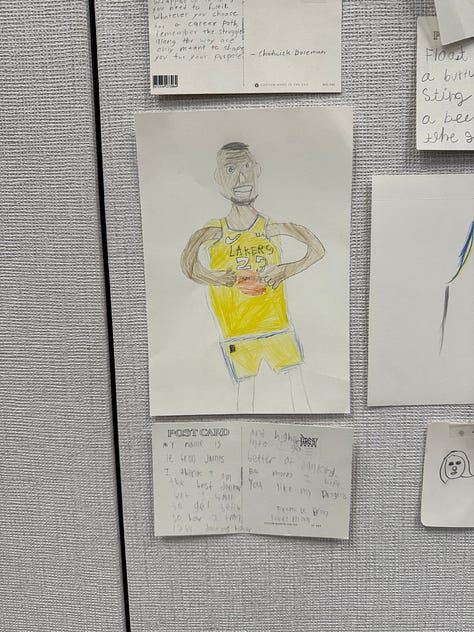 Children's art on the wall at a town council meeting
