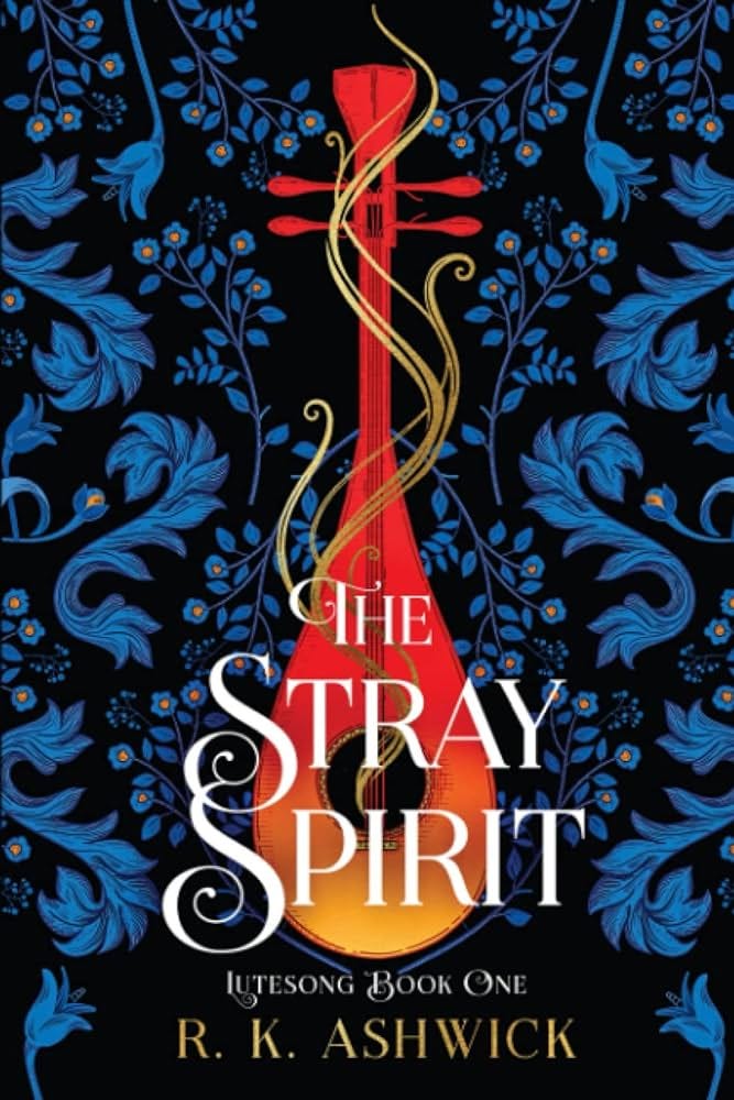 TThe cover of “The Stray Spirit” by R.K. Ashwick which features a gold and red lute threaded with golden energy on a black background with blue leaves and flowers. La portada de “The Stray Spirit” de R.K. Ashwick que presenta un laúd dorado y rojo con energía dorada sobre un fondo negro con hojas y flores azules.