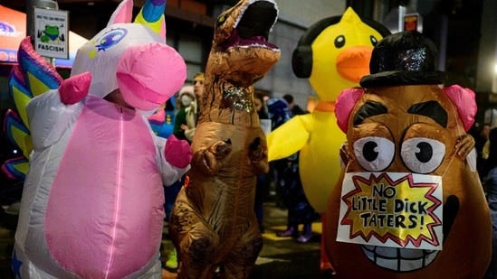 Why are 'No Kings' protesters turning up in frog, chicken, rooster, T. rex  costumes? Explaining the trend | Hindustan Times
