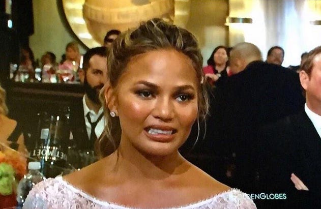 TOMT] The weird half-smile woman meme : r/tipofmytongue