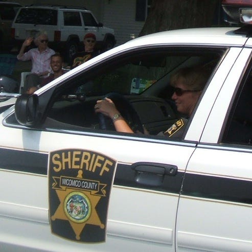 Sheriff candidate and current second-in-command Doris Schonbrunner paces the parade. Sheriff candidate and current second-in-command Doris Schonbrunner paces the parade.