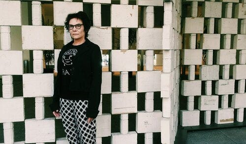 An image of director Salome Chasnoff, standing in front of a wall. An image of director Salome Chasnoff, standing in front of a wall.