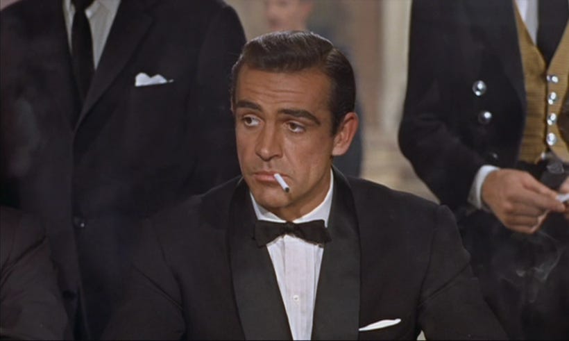 Sean Connery as James Bond at a card table