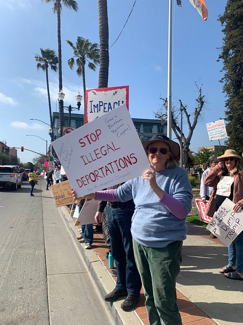 Protestors with signs, crowds